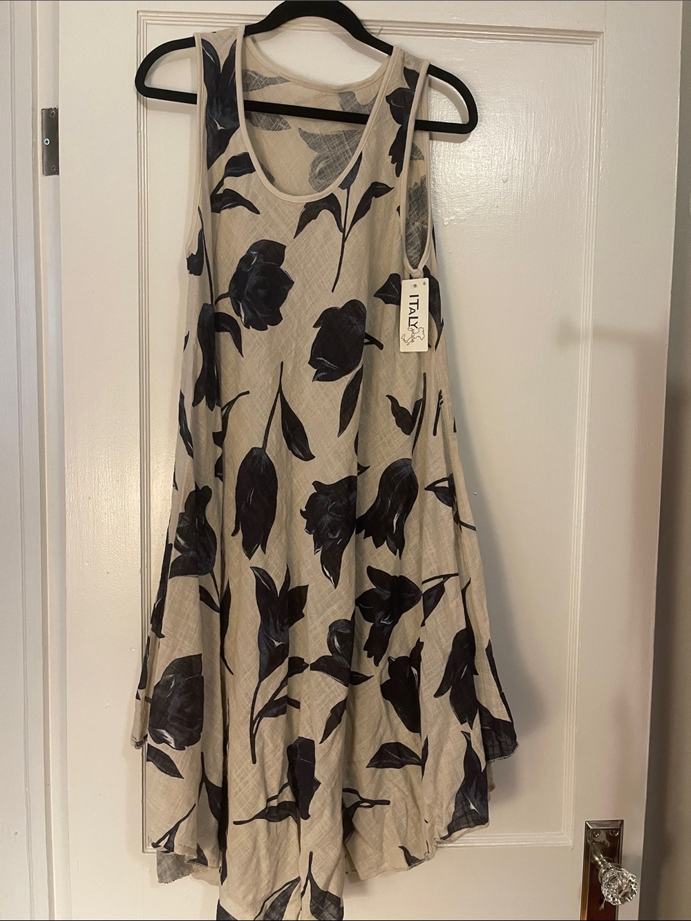 Sleeveless Floral Swing Dress in Beige and Black